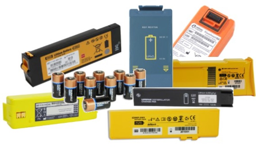 When should I replace the batteries in my defibrillator?
