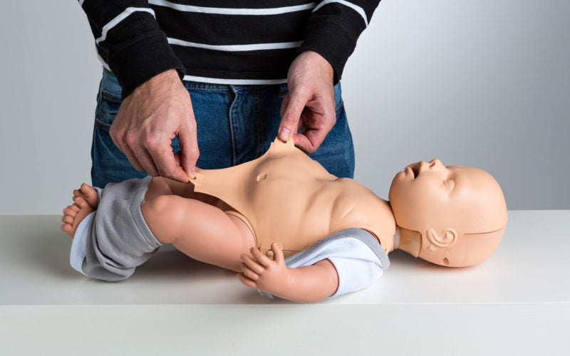 Practi-Baby Manikin With Bag