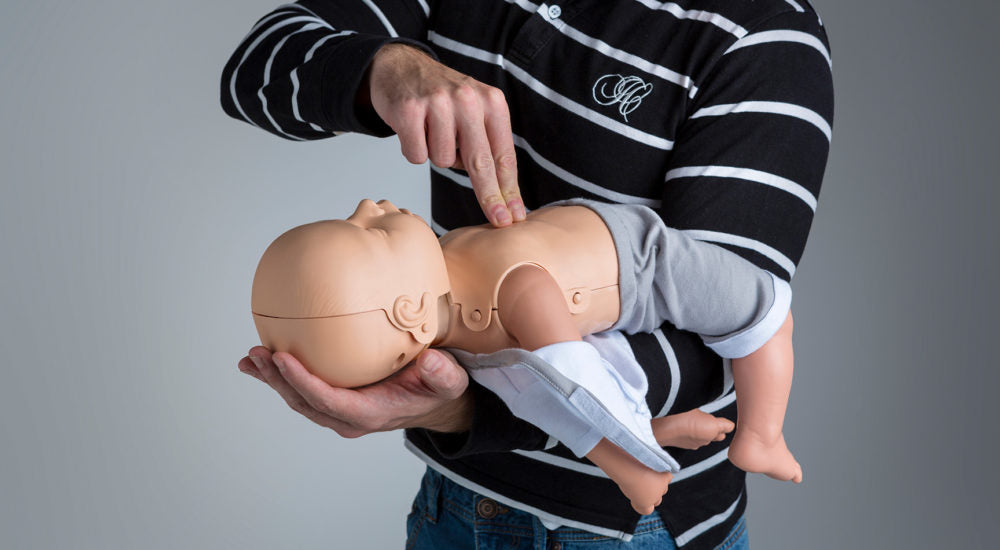 Practi-Baby Manikin With Bag